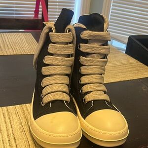 High-Top Black and Cream Athletic Shoes